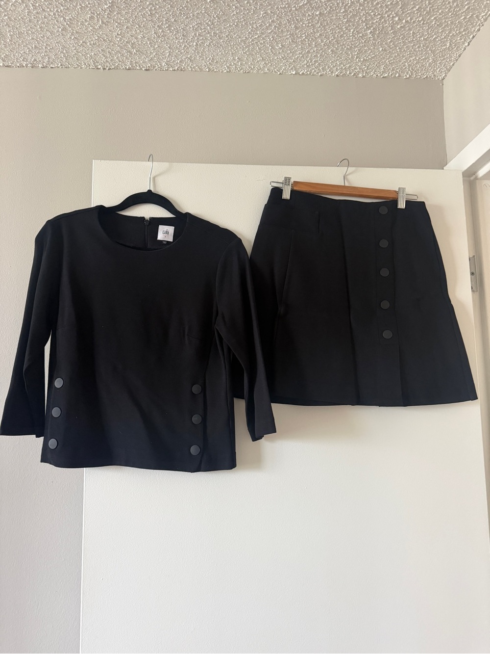 CAbi Black Button-Front Mini Skirt